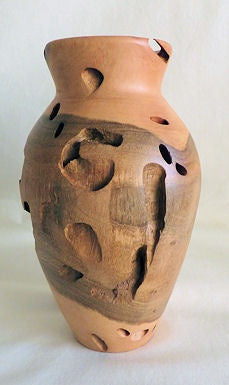 Myriad of Borer holes - wooden sculpture - Henry Pamula