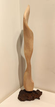 Load image into Gallery viewer, Side view of Roderick Glen’s Huon pine sculpture showing its flowing curved form and natural timber grain.