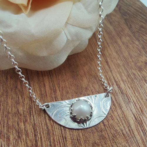 Handmade sterling silver necklace with embossed half-circle spoon pendant and 8mm cultured pearl, on cable chain with extender