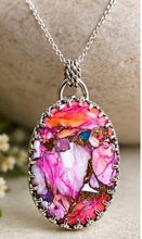 Load image into Gallery viewer, Close-up of vibrant Spiny Oyster Turquoise stone set in a sterling silver gallery wire bezel