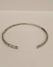 Load image into Gallery viewer, A silver bangle with twisted  ends