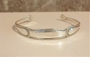 front view of antique silver cuff