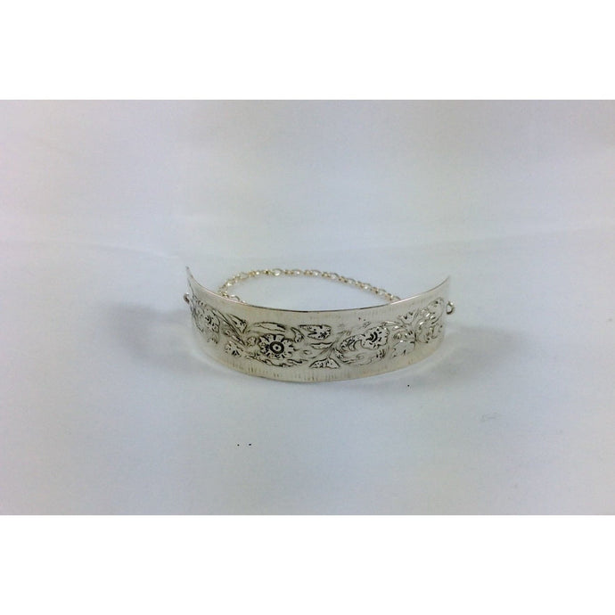 sterling silver floral etched bracelet.