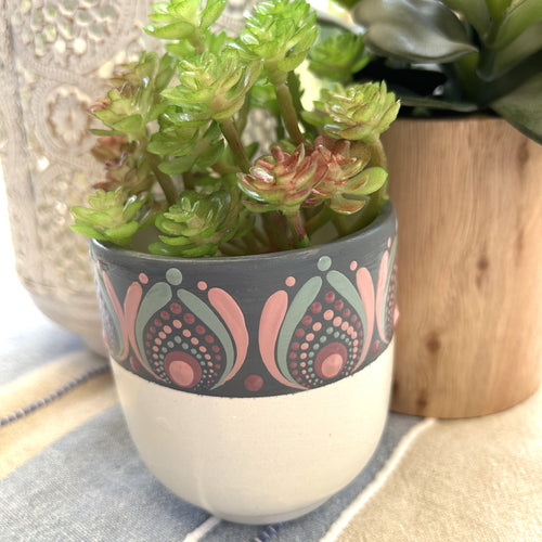 Painted pot plant holder