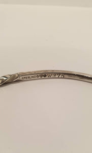 Hallmark on the inside of the silver bangle